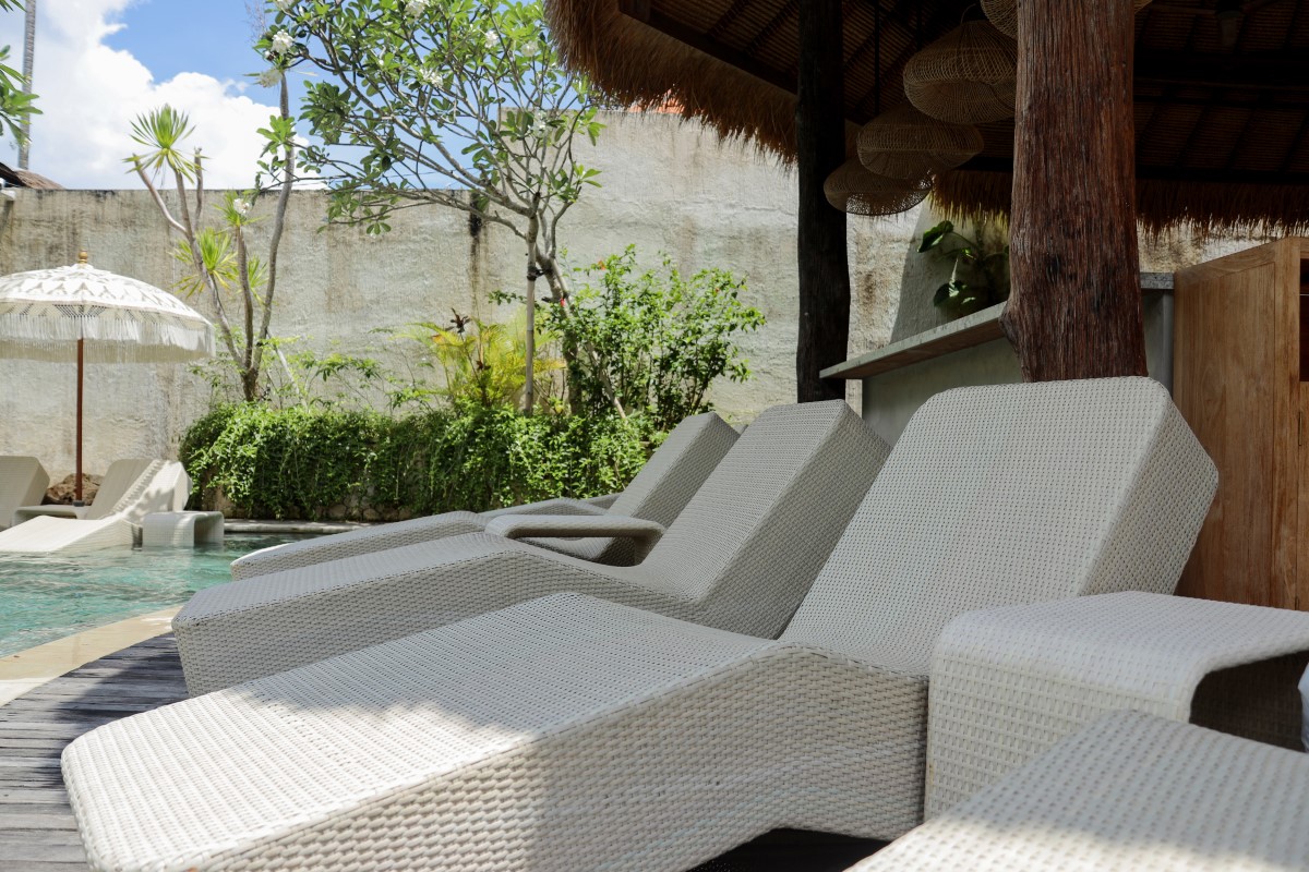 minimalist-sun-beds-sunny-garden-with-no-one-it (Custom)